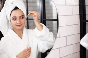 woman applying skincare