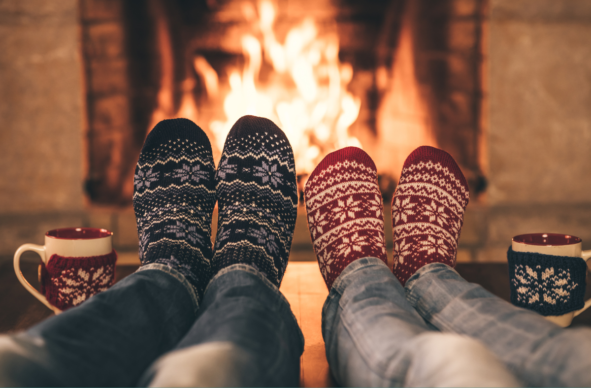 holiday socks by a cozy fireplace